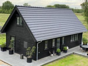 Dansk Design Møder Naturen – Arkitekttegnede Træhuse I Topklasse