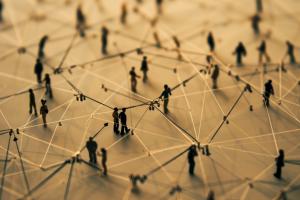People connected by a network. A Better Code.