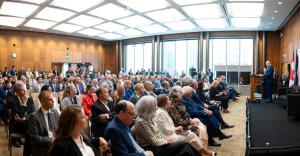 Audience at a NATO Association of Canada event listening intently to the Honourable David Collenette