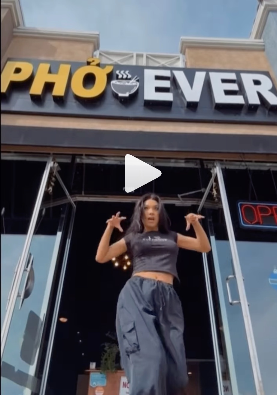 Staff in front of Pho Ever Storefront