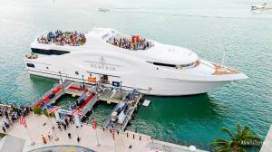 Aerial view of Seafair yacht docked in Miami, filled with guests during a corporate event organized by Prime Experiences