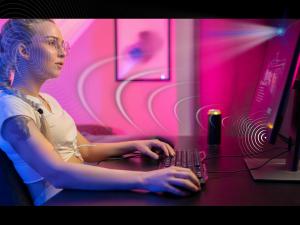 Photo shows sound waves being directed from a monitor to the viewer's ears.