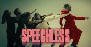 A dramatic portrait from the "Speechless" music video, featuring Jakub Chmelar in symbolic attire, captured to represent the themes of voice, identity, and pride