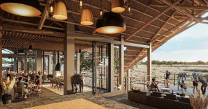 Rendered interior of Thitaka Lodge’s open-plan main area, featuring thatched roofing, natural stone floors, and warm lighting. Guests are seen dining and relaxing indoors, while others gather on the outdoor deck overlooking a savannah landscape with eleph