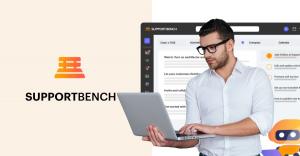 Man smiling while using Supportbench platform dashboard with visible support levels and case details for mid-sized team operations.