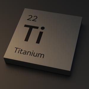 Image of a titanium element tile marked with 'Ti' and atomic number 22, representing NEQSOL Holding’s acquisition of Ukrainian titanium producer UMCC