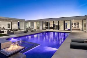 Fire, water, and glass converge in perfect modern harmony