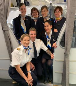 Her leadership of an all-women crew across the runway radiates unshakable confidence—an embodiment of strength, precision, and a rare presence in the world of aviation.