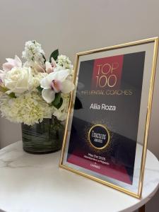 Aliia Roza wearing Tess Mann Atelier receives Top 100 Influential Coaches award at the I Success Awards ceremony. Photo used with permission ©AliiaRoza.