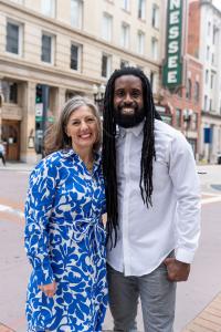 Dr. Kimberly Quigley, CEO of Onrise, and Derrick Furlow Jr., Chief Athletic Officer, stand together, symbolizing their collaborative commitment to advancing mental health care for athletes