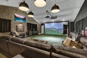 220 inch impact projection screen in entertainment room