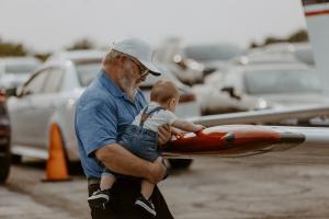 Baby and Grandpa at the Hangar Groundbreaking Ceremony at Lee's Summit Airport