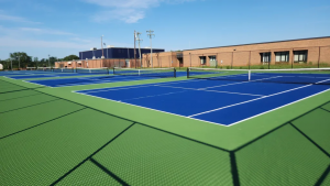 Pickleball courts in Raleigh surfaced with Polypave Court Shield crack prevention system for new asphalt court construction