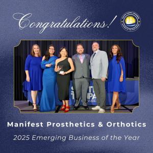 Manifest Prosthetics and Orthotics leadership team accepts the 2025 Emerging Business of the Year Award on stage at the South Tampa Chamber of Commerce ceremony