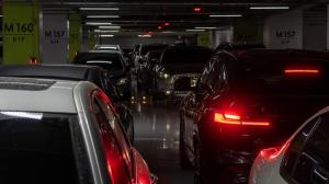 Overcrowded parking structure showing vehicles circling for space—highlighting the need for smarter mobility management.