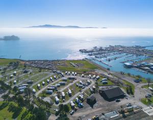 Overview of Roam Tillamook RV Resort with views of Tillamook Bay and adjacent Port of Garibaldi
