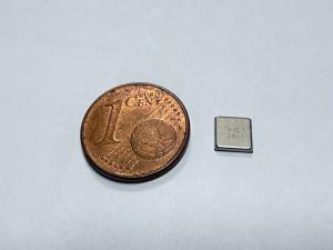 Image comparing SpectroMic KWS beside a penny