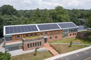 Drone photo of Maplewood Memorial Library. The library's $24M rebuild makes it 33% larger, expanding to 32,000 sq. ft. and adding a floor. It will be New Jersey's first Leadership in Energy & Environmental Design (LEED) Gold library. Photo credit: Mason L
