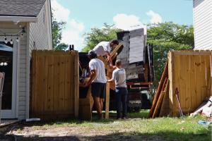 Black Dog Crew Loading up the Junk Truck