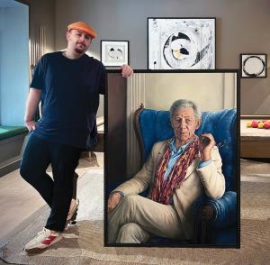 Artist Dorian Radu with the portrait of Sir Ian McKellen to be unveiled at the London Biennale