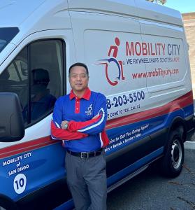 Photo of Owner Peter Yi and technician van equipped as a 'workshop on wheels' for on site mobility equipment repairs