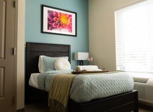 twin size bed at patient room in The Haven Detox - West Memphis