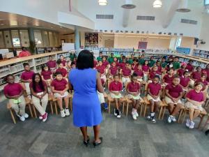Embrace Girls listen closely during social skills training session.