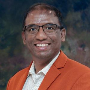 Photo of Mahesh Vinayagam, CEO and founder of qBotica