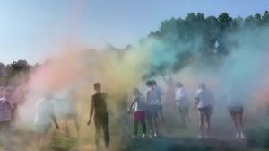 People throwing color
