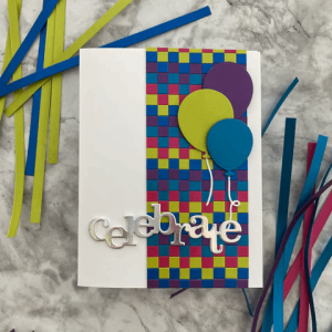 Colorful paper strips arranged in a neat checkerboard pattern, perfect for handmade greeting cards and creative scrapbook layouts.
