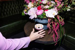 Rose of Sharon Floral Design's garden-style arrangement photographed at Lady Slipper, Bentonville for At Home in Arkansas magazine's Visionaries issue. Photo credit: @itsdaniellegreen for @layersphoto