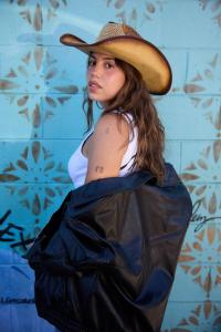 Beyond acting, Viandka Carrillo is the creative mind and performer behind the visual projects of indie band The Citie, directing and starring in their videos while shaping their unique artistic identity through her vision.