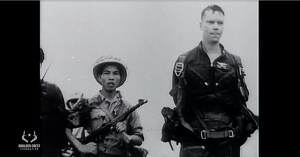 An American POW being taken into captivity during the Vietnam War
