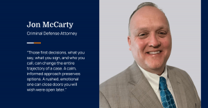 Portrait of Jon McCarty, Criminal Defense Attorney at The Valley Law Group, alongside his quote about the importance of early decisions after an arrest.