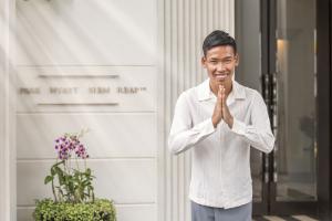 A welcoming gesture by Cambodians
