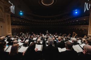 A photo from a performer's stage view of Carnegie Hall looking out at the audience